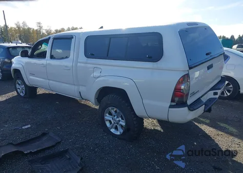 2015 Toyota Tacoma Base V6 z USA, uszkodzony, nr VIN 3TMMU4FN4FM077170
